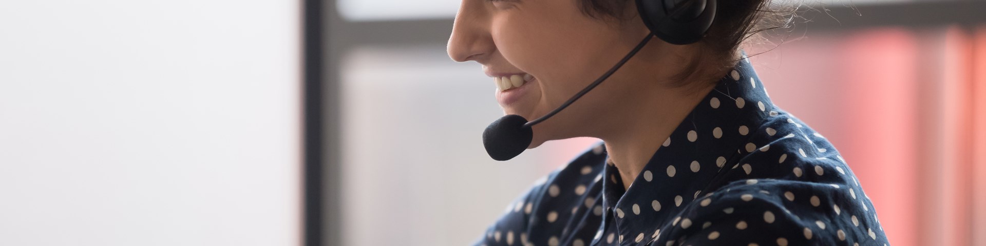 Woman smiling answering phone calls